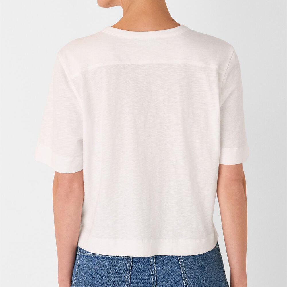 Wit T-shirt met knoopsluiting en halslijn