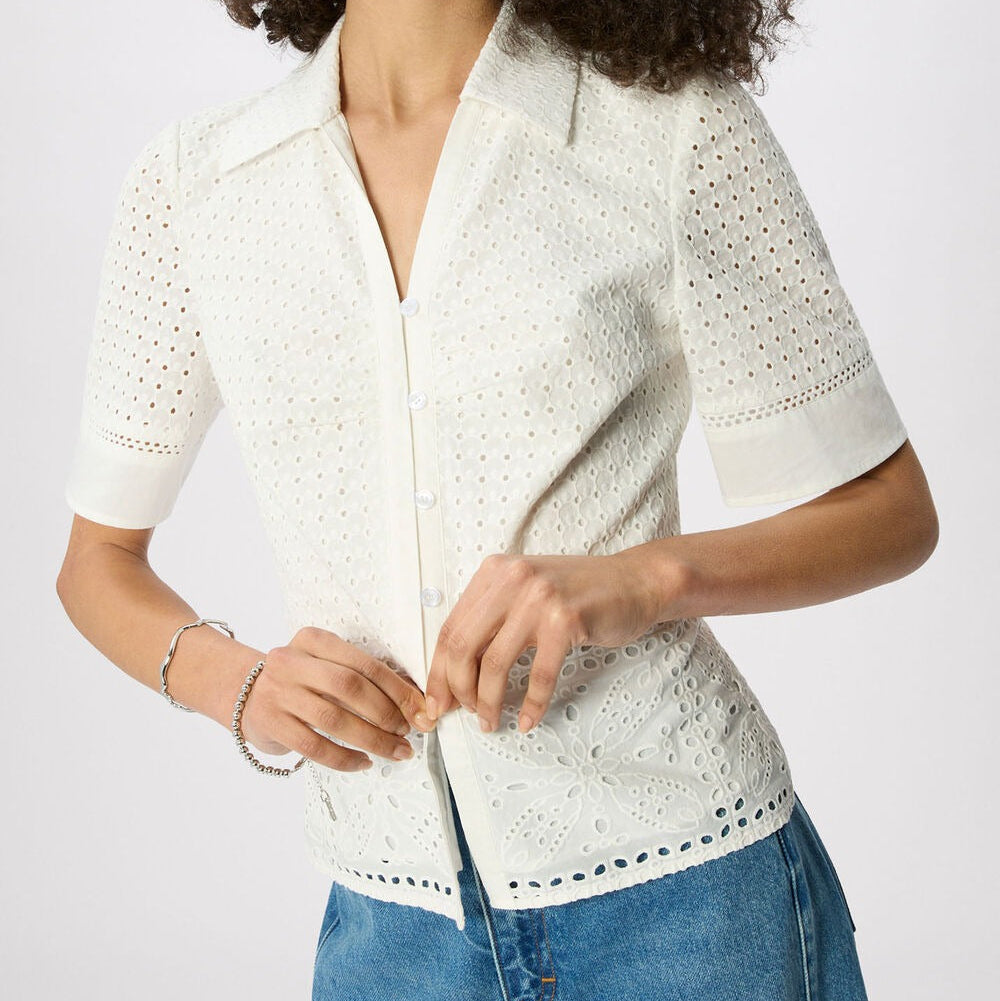 Witte blouse met opengewerkt patroon