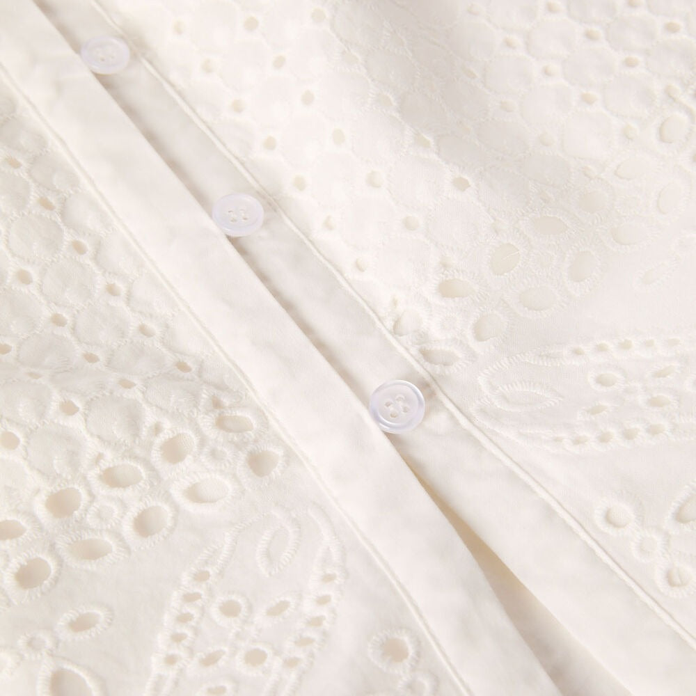 Witte blouse met opengewerkt patroon